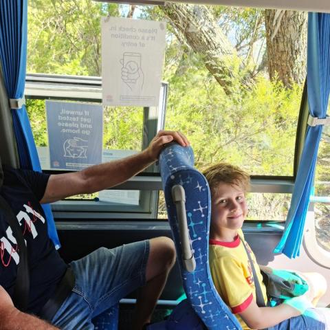 a man sitting in front of a window