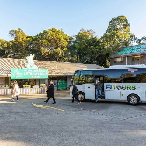 a bus that is parked on the side of a road