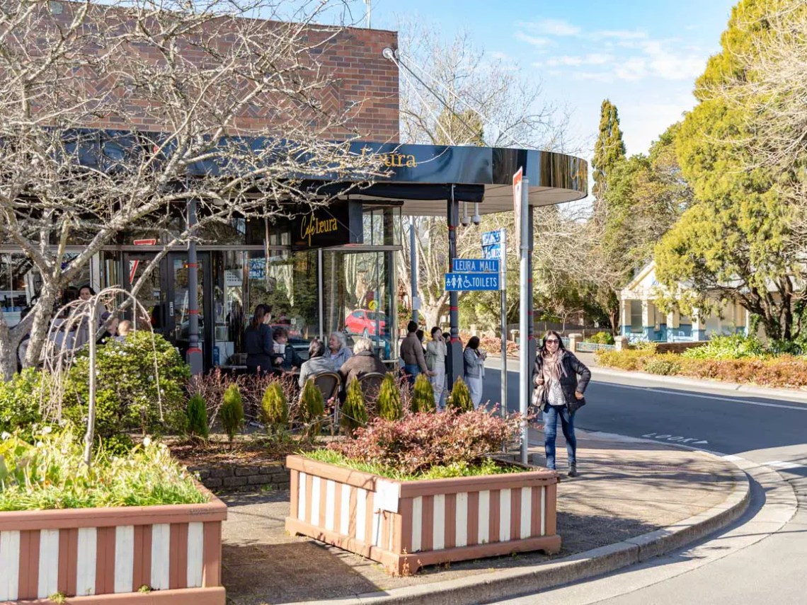 a bench on the side of a building